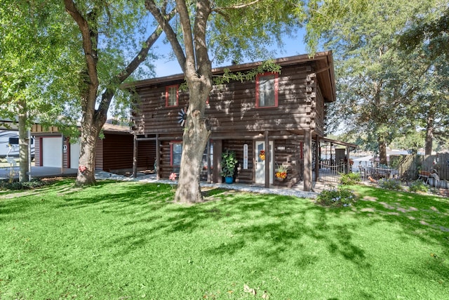 view of front of property with a front lawn