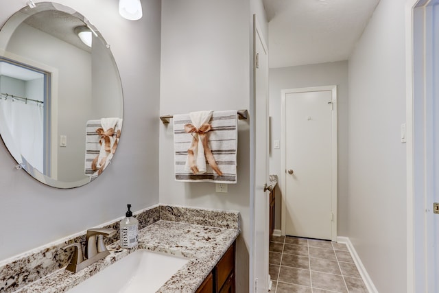 bathroom featuring vanity and tile patterned floors