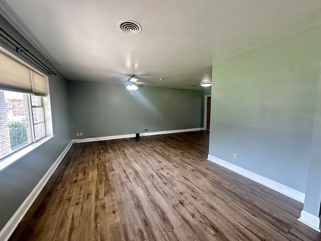 unfurnished room featuring ceiling fan and hardwood / wood-style floors