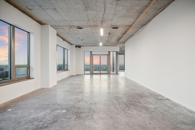 spare room featuring concrete floors