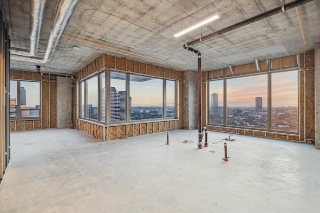 misc room with concrete flooring