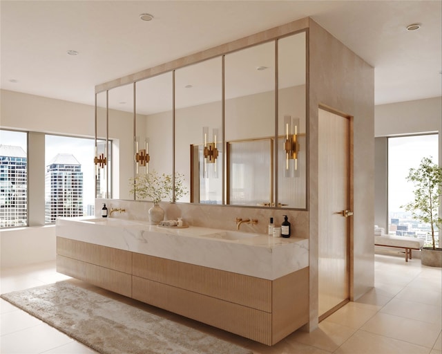 bathroom with vanity and tile patterned flooring