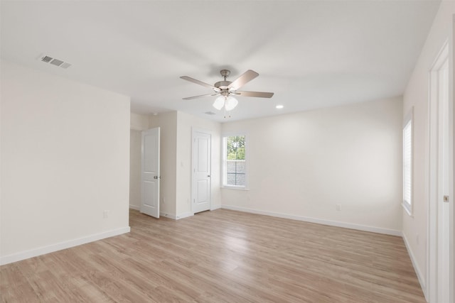 1310 E Alamo St A-B, Unit A-B Brenham, TX 77833 - unfurnished room featuring visible vents, baseboards, ceiling fan, recessed lighting, and light wood-style flooring