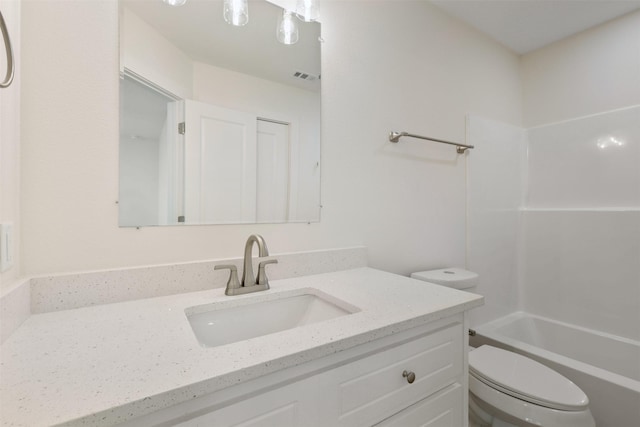 1310 E Alamo St A-B, Unit A-B Brenham, TX 77833 - bathroom featuring vanity, visible vents, toilet, and tub / shower combination
