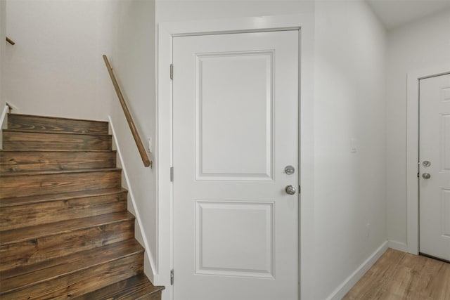 1310 E Alamo St A-B, Unit A-B Brenham, TX 77833 - stairs featuring baseboards and wood finished floors