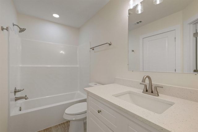 1310 E Alamo St A-B, Unit A-B Brenham, TX 77833 - full bath with vanity, recessed lighting, toilet, visible vents, and tub / shower combination