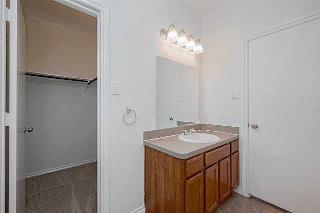 bathroom with vanity and tile patterned floors