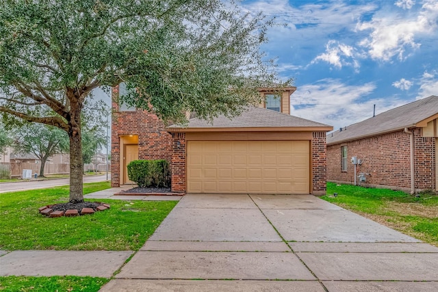 view of front of property featuring a garage and a front yard