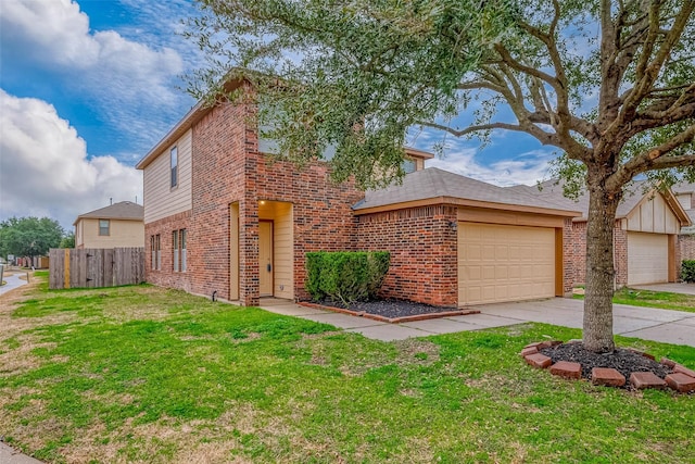 view of front of property featuring a garage and a front yard