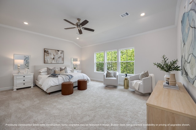 carpeted bedroom featuring ceiling fan, lofted ceiling, and crown molding