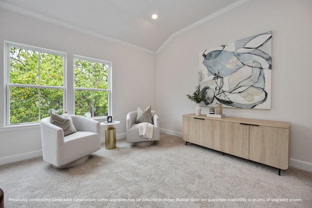 living area with ornamental molding, vaulted ceiling, and light carpet