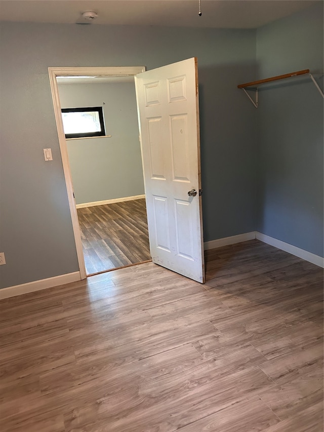 empty room featuring hardwood / wood-style floors