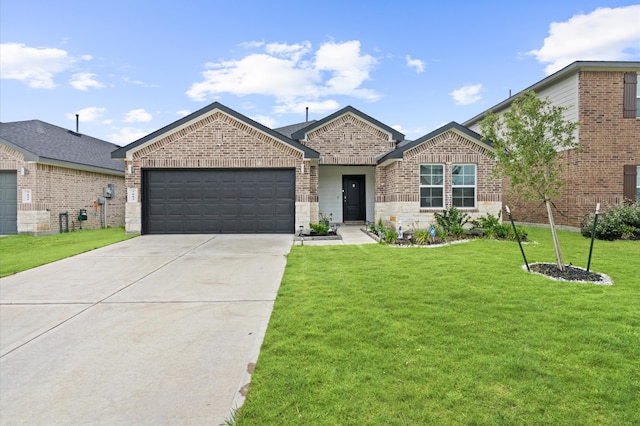 view of front of property with a garage and a front lawn