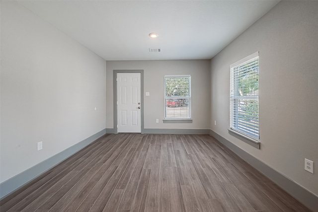 empty room featuring hardwood / wood-style floors