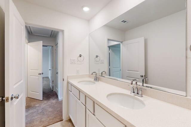 bathroom with vanity and tile patterned floors