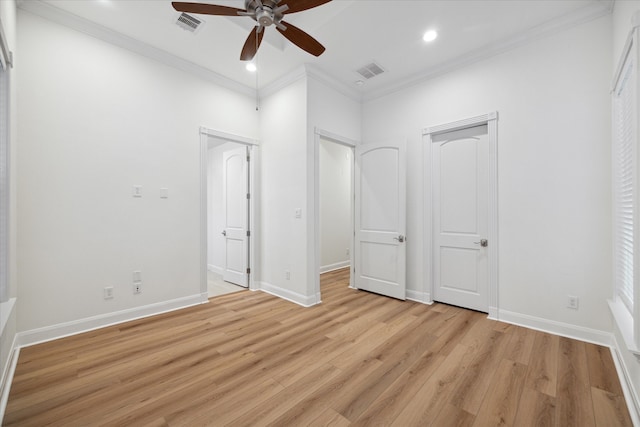 unfurnished bedroom with ceiling fan, crown molding, and light hardwood / wood-style flooring