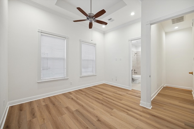 unfurnished room featuring ornamental molding, ceiling fan, and light hardwood / wood-style floors