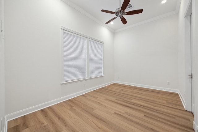 unfurnished room with ceiling fan, light hardwood / wood-style flooring, and ornamental molding