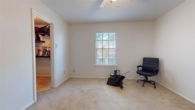 unfurnished room with ceiling fan and light colored carpet