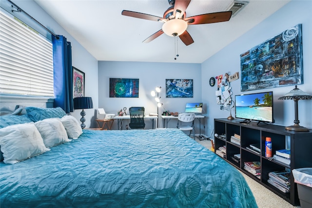 carpeted bedroom featuring ceiling fan