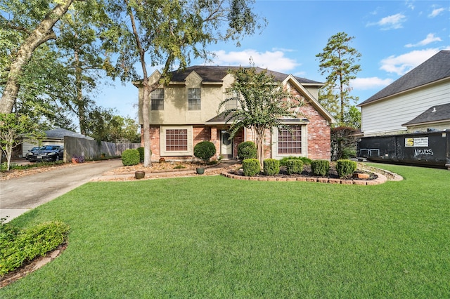 front facade with a front yard