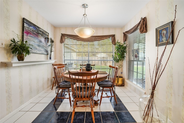 dining space featuring tile patterned floors