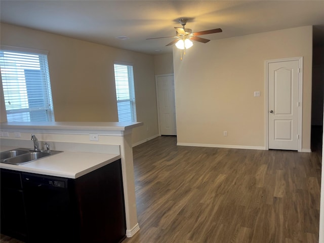 kitchen featuring sink, dark wood-type flooring, dishwasher, and ceiling fan