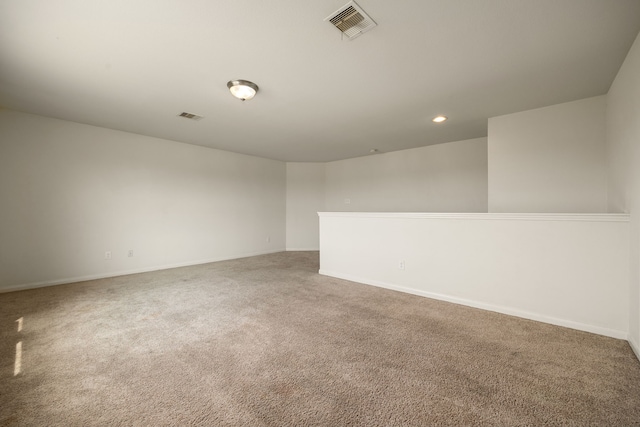 empty room with carpet flooring