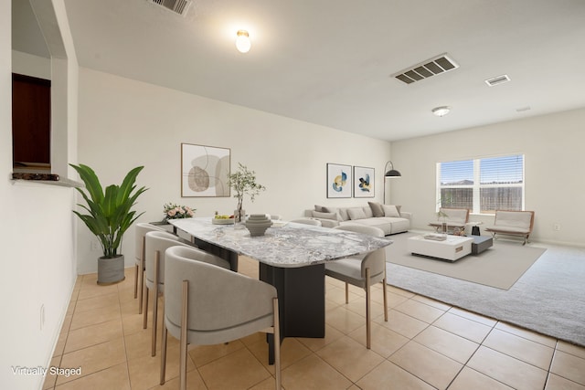 view of tiled dining area