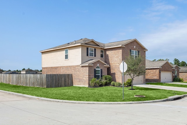 view of front facade featuring a front yard and a garage