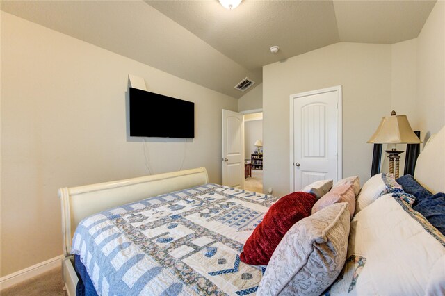 2446 Wembley Way, Rosenberg, TX 77471 - bedroom with carpet flooring, vaulted ceiling, and baseboards