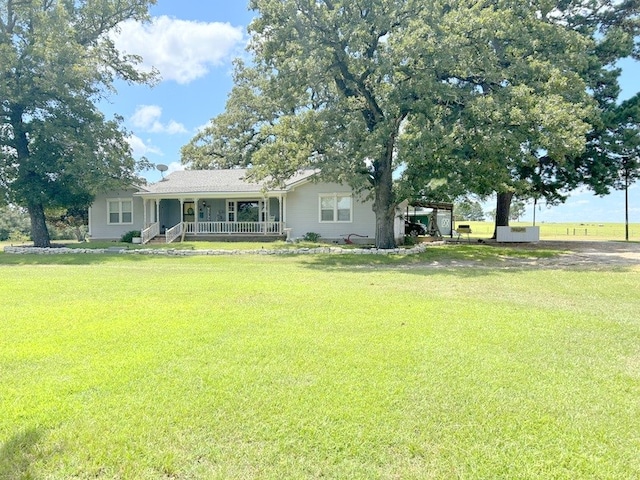 view of yard featuring a porch