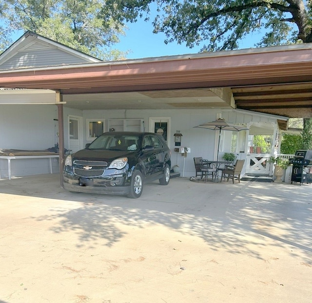 view of car parking featuring a carport