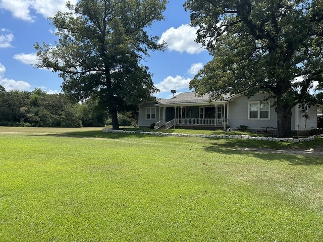 view of yard with a porch