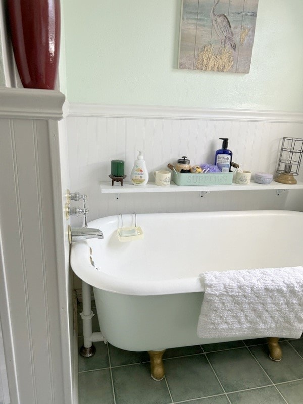 bathroom featuring a tub and tile patterned flooring