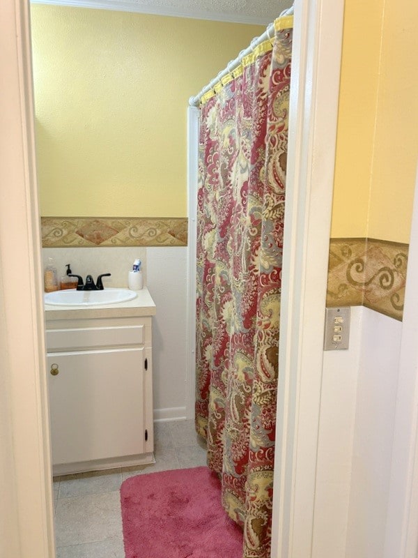 bathroom featuring vanity and tile patterned floors