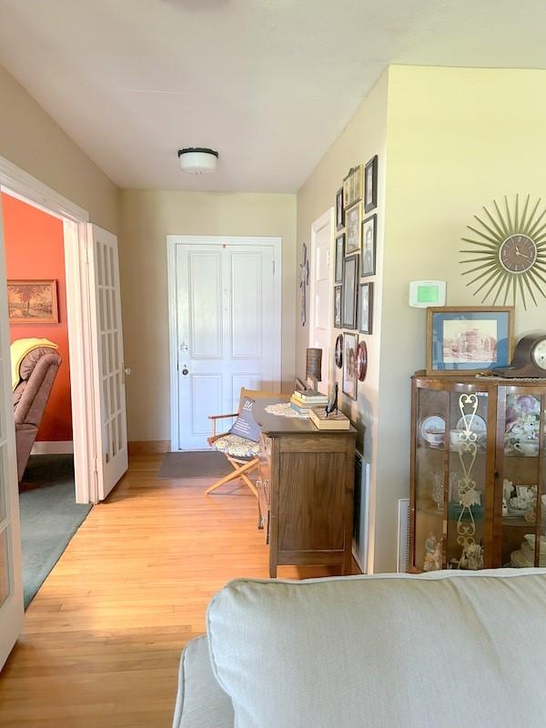 interior space with hardwood / wood-style floors