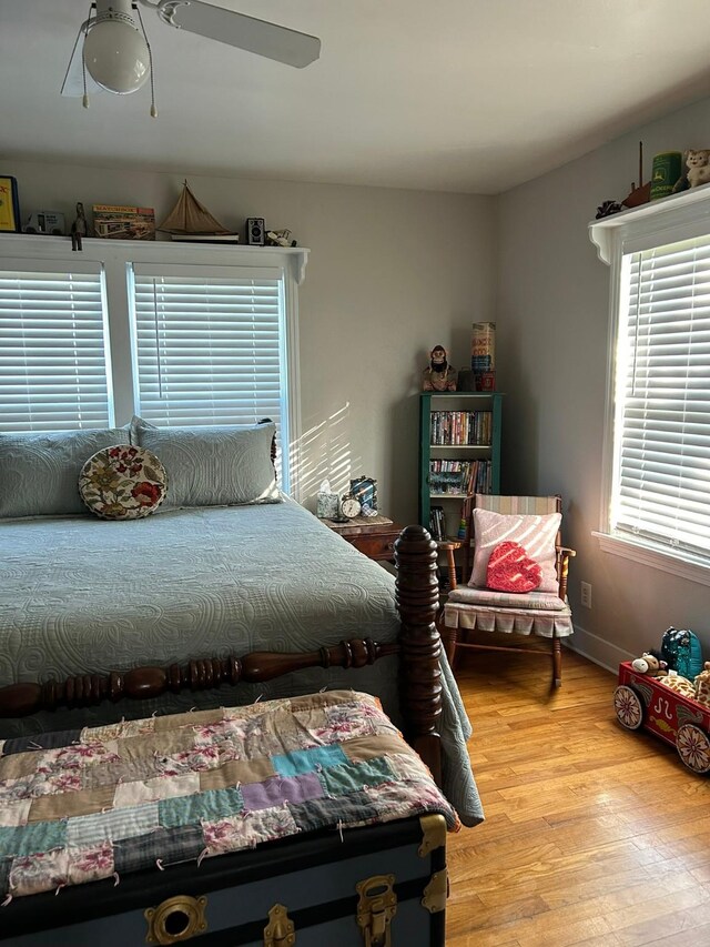 bedroom featuring ceiling fan and light hardwood / wood-style floors