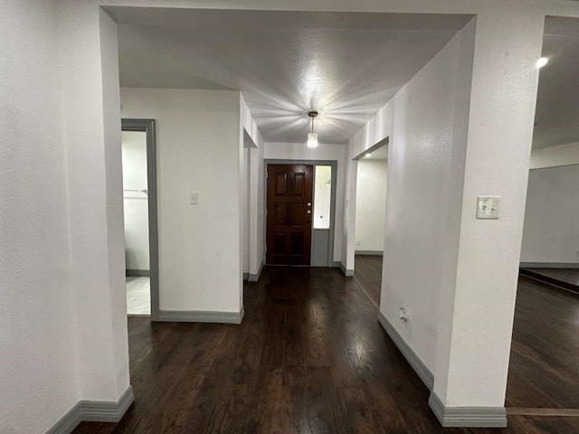 foyer featuring dark hardwood / wood-style floors