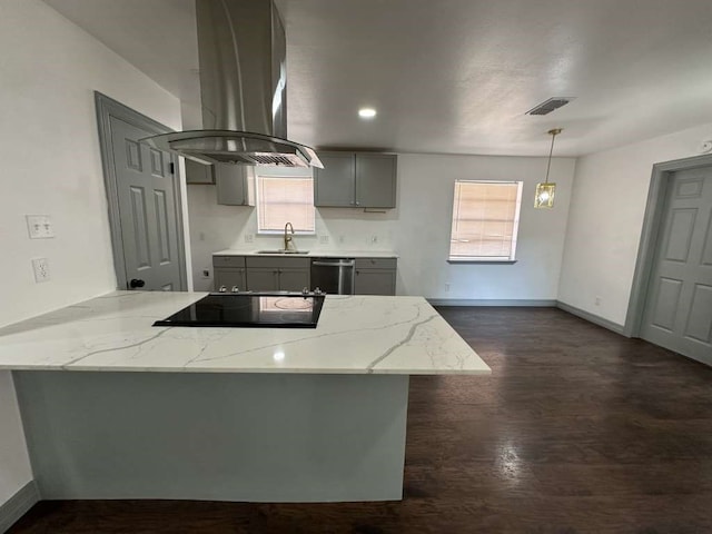 kitchen with kitchen peninsula, island range hood, hanging light fixtures, gray cabinets, and dishwasher