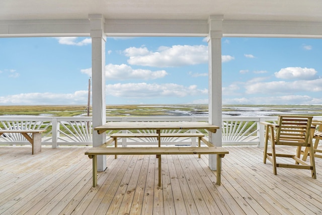 555 Pompano Dr Unit Q, Freeport, TX 77541 - wooden terrace featuring a water view