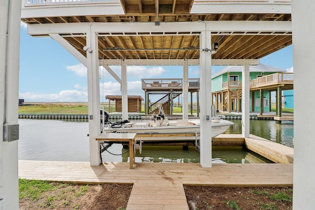 dock area with a water view