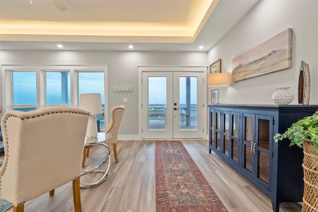 555 Pompano Dr Unit Q, Freeport, TX 77541 - sitting room with light wood-type flooring, french doors, and recessed lighting