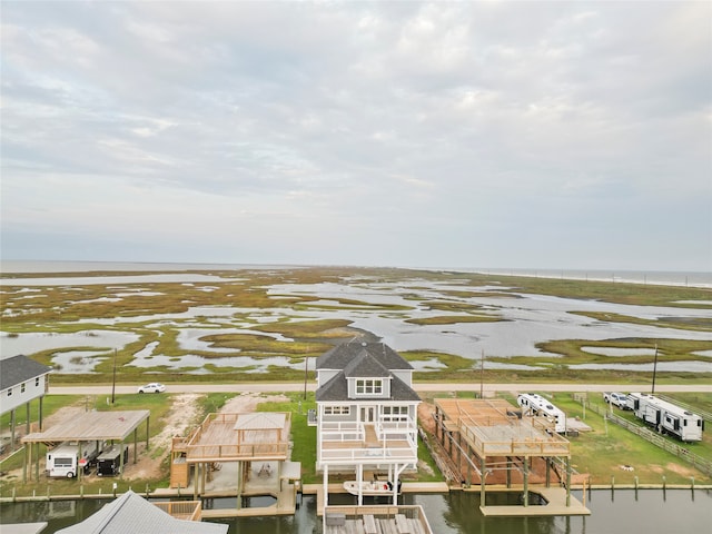 aerial view featuring a water view