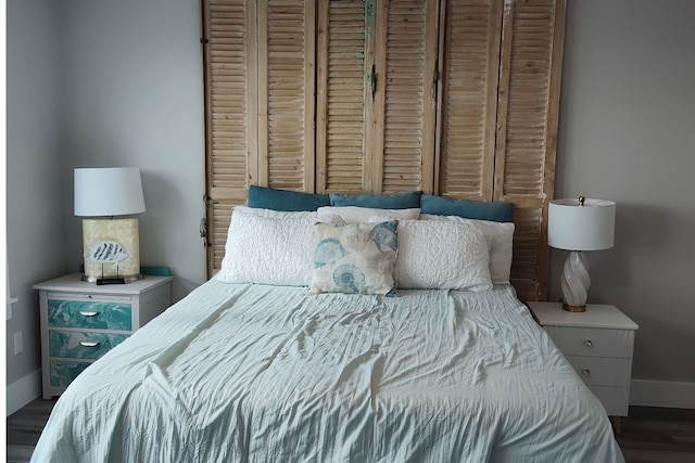 bedroom featuring dark hardwood / wood-style floors