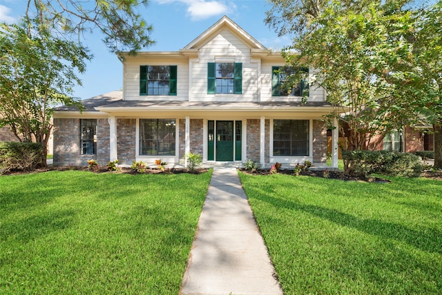 view of front of home with a front lawn