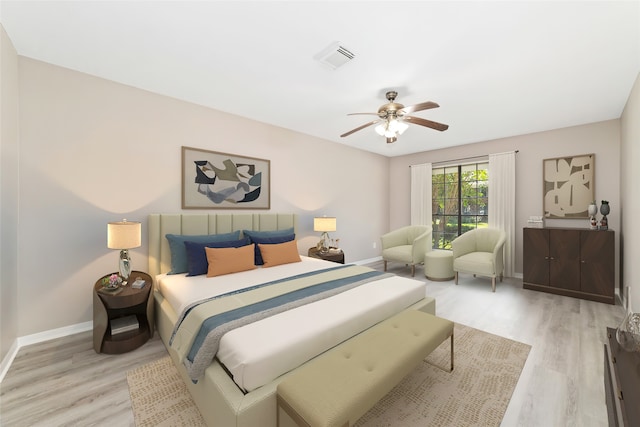 bedroom featuring light wood-type flooring and ceiling fan