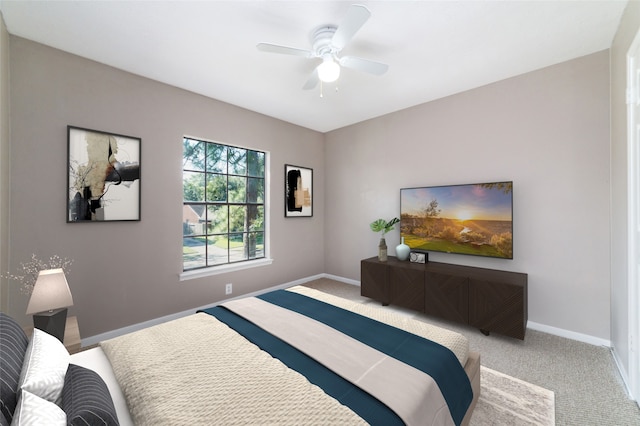 bedroom with ceiling fan and carpet flooring