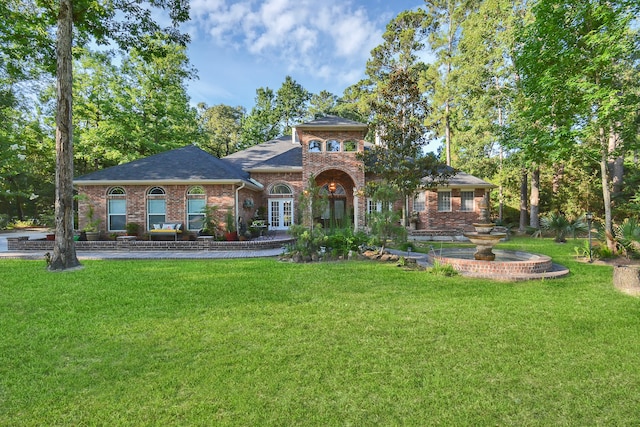 view of front facade featuring a front yard