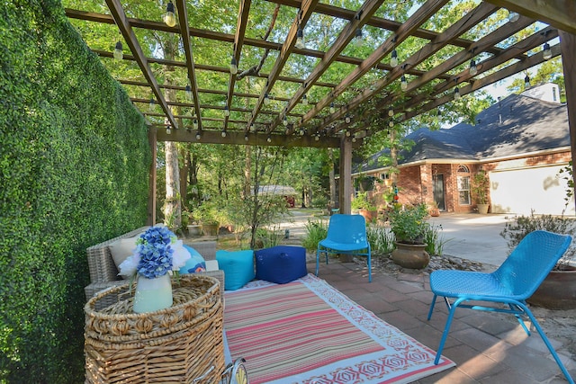 view of patio featuring a pergola